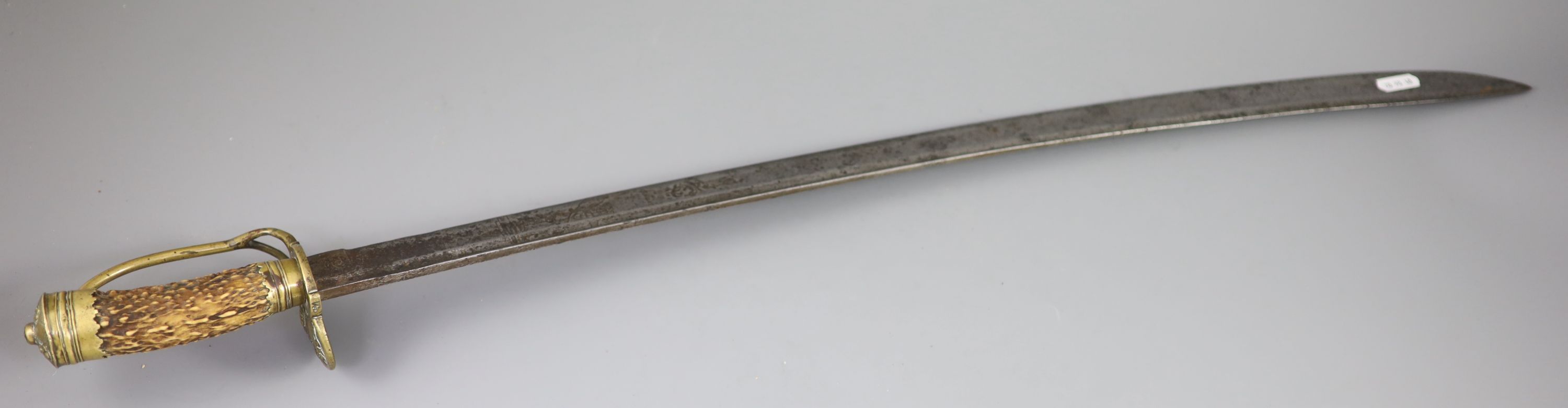 A late 17th century military hangar sword, length 34in.